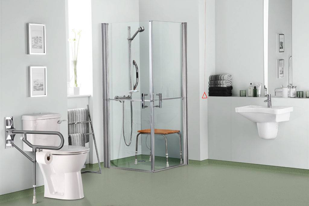 accessible wet room with sage green flooring